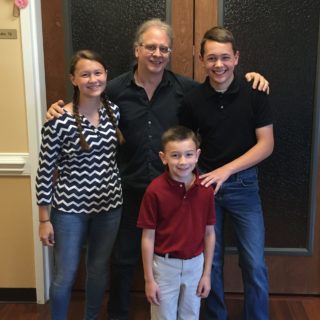 Williams family with guitar teacher Robert Bussey