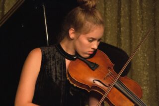 teenager plays viola