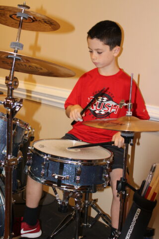 drum student at charlotte academy of music