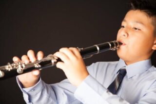 student playing the clarinet